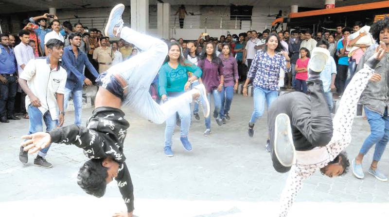 Students performing flash mob to promote Smart City project at KSRTC Bus Station in Thampanoor on Tuesday. (Photo: DC)