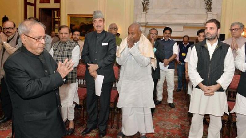 Ghulam Nabi Azad, Leader of Opposition, Rajya Sabha, HD Devegowda, Congress Vice President Rahul Gandhi alongwith a Committee members of 17 political Parties meeting with the President Pranab Mukherjee on Income Tax Amendment Bill at Rashtrapati Bhavan in New Delhi on Thursday. (Photo: PTI)