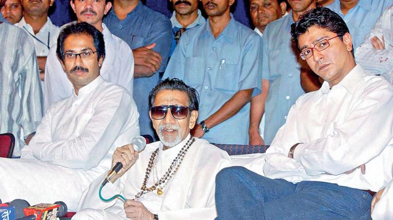 Shiv Sena chief Bal Thackeray flanked by Uddhav and Raj