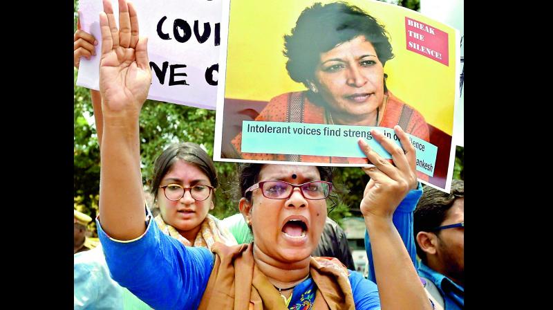 Scribes carry out a protest against the killing of Gauri Lankesh, near Chennai Press Club on Wednesday. (Photo: PTI)