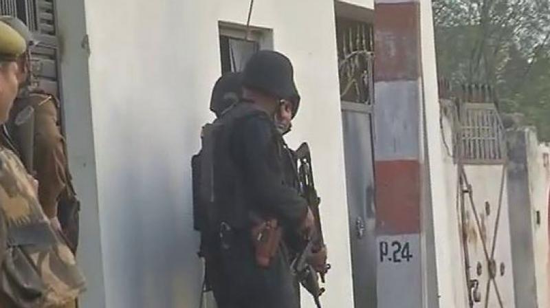 A shootout between a suspected terrorist and Uttar Pradesh Anti-Terror Squad began in Thakurganj area of Lucknow on Tuesday. (Photo: ANI/Twitter)