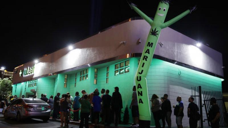 In this Saturday, July 1, 2017, photo, people line up at the NuLeaf marijuana dispensary in Las Vegas.(Photo: AP)