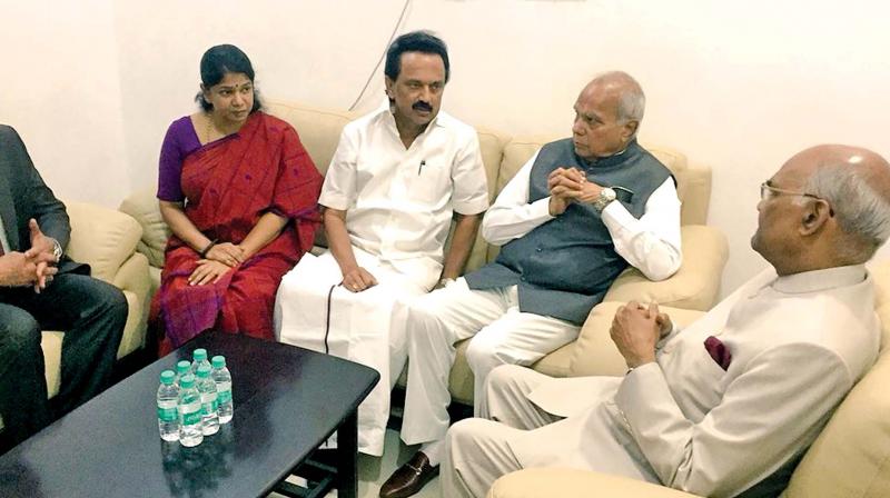 President Ramnath Kovind interacts with DMK working president and MP Kanimozhi in Chennai on Sunday. Governor Banwarilal Purohit is also present.  (Photo:DC)