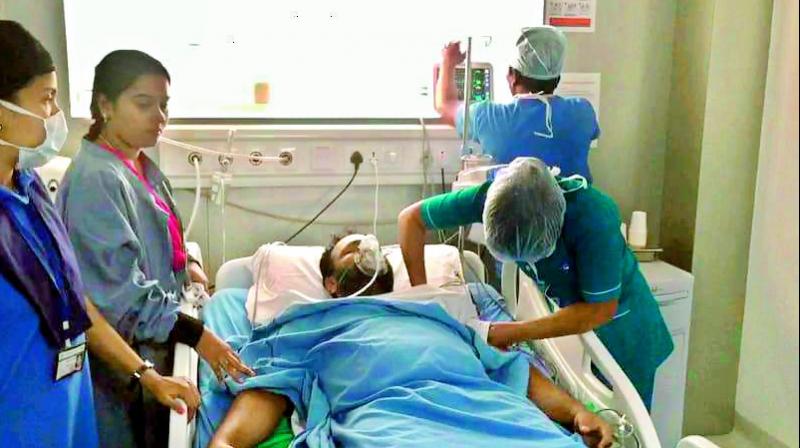 M. Govardhan Reddy, an aspirant for the TRS ticket for Khairatabad constituency,  admitted at a hospital after he claimed of having a heart attack during a protest at the TRS Bhavan on Tuesday. 	   Image: DC