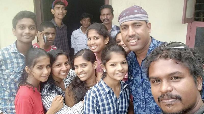 Rafeeq Mangalasserry (blue shirt) and the crew of Kithab drama