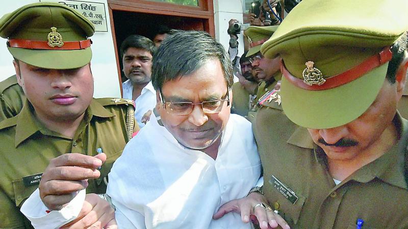 Rape-accused UP minister Gayatri Prajapati arrested by police in Lucknow on Wednesday. (Photo: PTI)