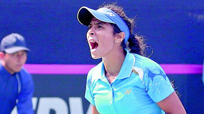 Ankita Raina celebrates her win over Chinese Taipeis Chieh-Yu Hsu in the Fed Cup on Saturday.