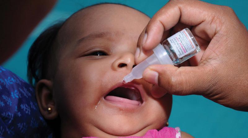 File picture of a child being administered Polio oral vaccine in Kochi.