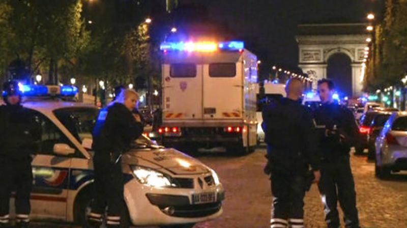 In this image made from video, police attend the scene after an incident on the Champs-Elysees with Arc de Triomphe in background in Paris, Thursday April 20, 2017. (Photo: AP)