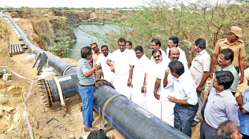 Local administration minister S. P. Velumani on Saturday inspects quarries in Mangadu from where water is drawn for drinking water distribution. (Photo: DC)
