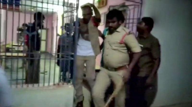 The entire incident which was caught on camera showed angry people rattling the locked gate of the police station and trying to enter the premises. (Photo: YouTube | Screengrab)