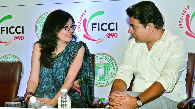 Minister K.T. Rama Rao interacts with Nivruti Rai, country head, Intel India, during an i-Telangana programme at HICC on Tuesday. (Photo: DC)