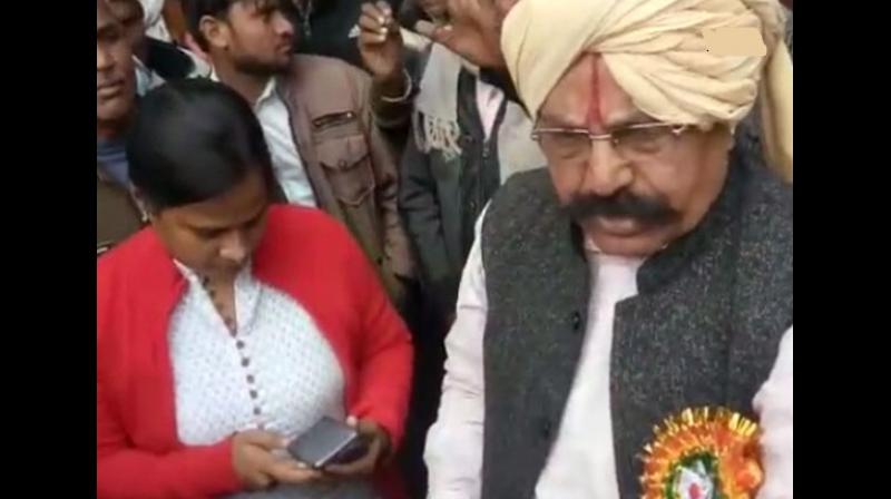Fatehpur Sikris BJP MLA Udaybhan Chaudhary had gone to meet Sub-divisional magistrate Garima Singh over farmers issue. (Photo: ANI)