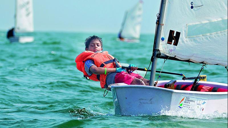 Sachin of Telangana heads for a silver medal in the Green Fleet at the India International Regatta.
