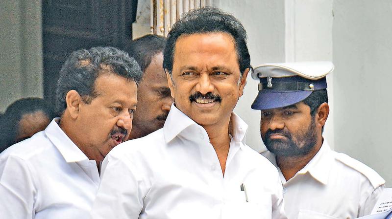 Opposition leader and DMK working president M.K. Stalin and his MLAs walk out of the Assembly. (Photo: DC)