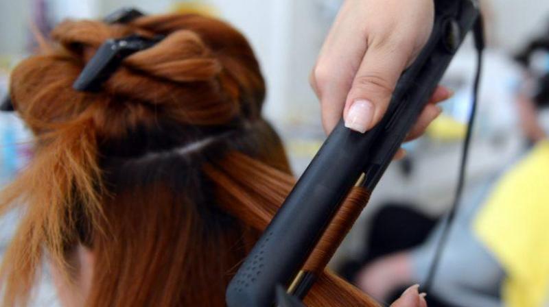 Those who visit salons have on average eight trims per year (Photo: AFP)