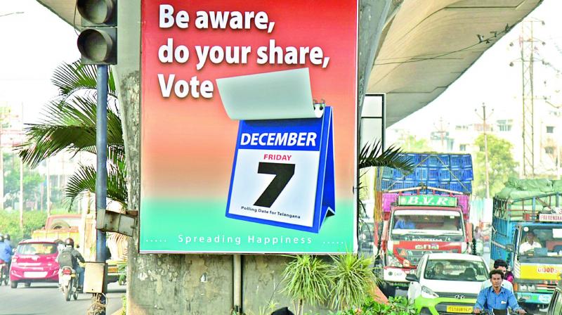 A billboard has been put on the pillars of PVNR Expressway to create awareness among voters. 	 DC