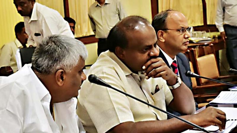 Chief Minister H.D. Kumaraswamy chaired a high level meeting regarding proposed construction of elevated corridor in Bengaluru city at Vidhana Soudha in Bengaluru on Thursday. PWD Minister H.D. Revanna and Chief Secretary T.M.  Vijayabhaskar are also seen	KPN