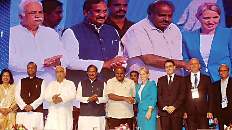 (From left) State Ministers Priyank Kharge, R.V. Deshpande, K.J. George, Chief Minister H.D. Kumaraswamy, Kate Jones Minister for Innovation, Tourism Industry Development, Queensland, Australia, and others during the  inauguration of Bengaluru Tech Summit 2018 at Bengaluru Palace on Thursday 	KPN
