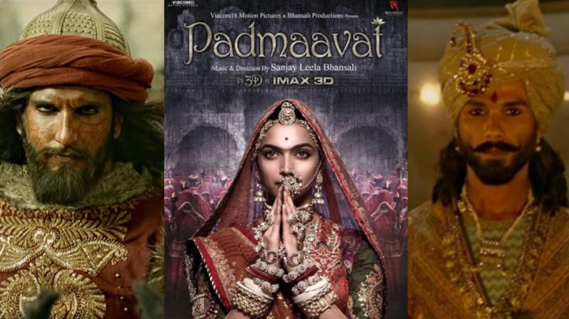 Ranveer Singh and Shahid Kapoor in a still from Padmaavat, Deepika Padukone on the poster.