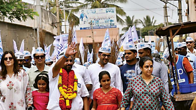 AAP candidate Prithvi Reddy arriving in a rally to file his nomination from Sarvagnanagar in Bengaluru on Thursday (Image:DC)