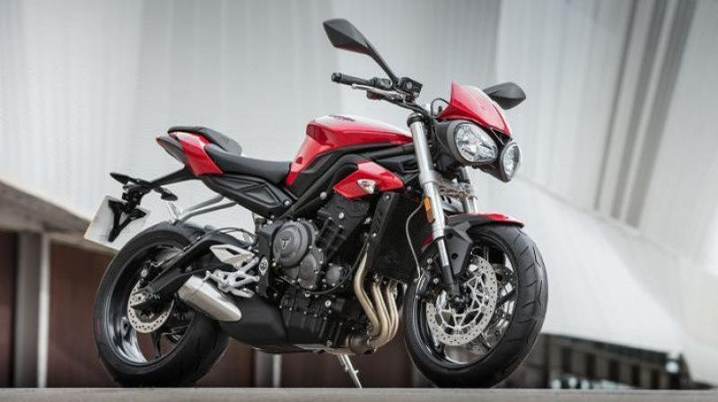 The bike gets new headlamps with integrated LED DRLs and a new LCD instrument console.