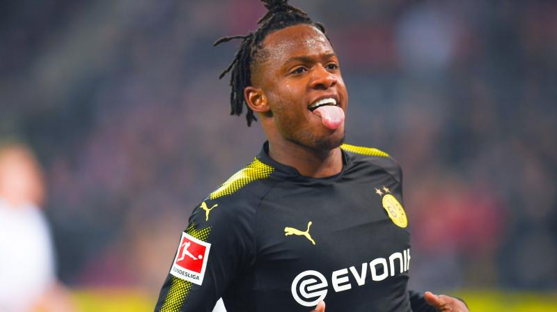 Michy Batshuayi finished teh game with 2 goals and 1assist as Dortmund beat Cologne 3-2. (Photo: AP)