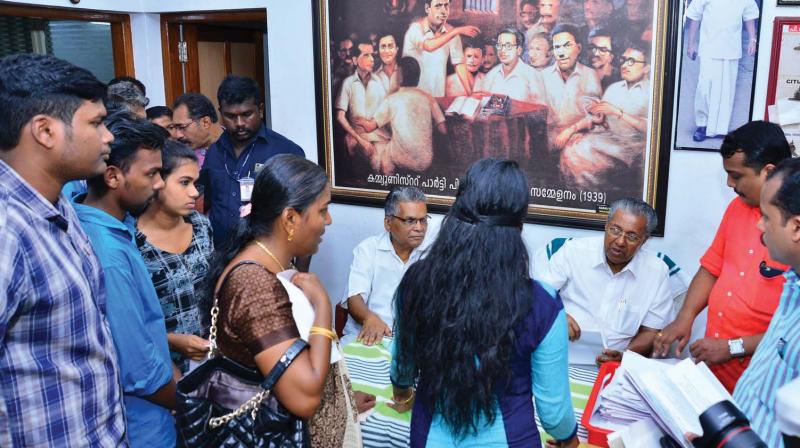 Chief Minister Pinarayi Vijayan listens to the grievances of the public in a session held at Pinarayi, Kannur, on Sunday.