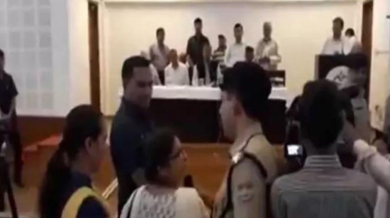 In video, Uttarakhand CM is seen losing his temper and directing the police to suspend the teacher, after she allegedly used abusive language and showed indecency, while seeking transfer from a remote location. (Photo: Screengrab | ANI)