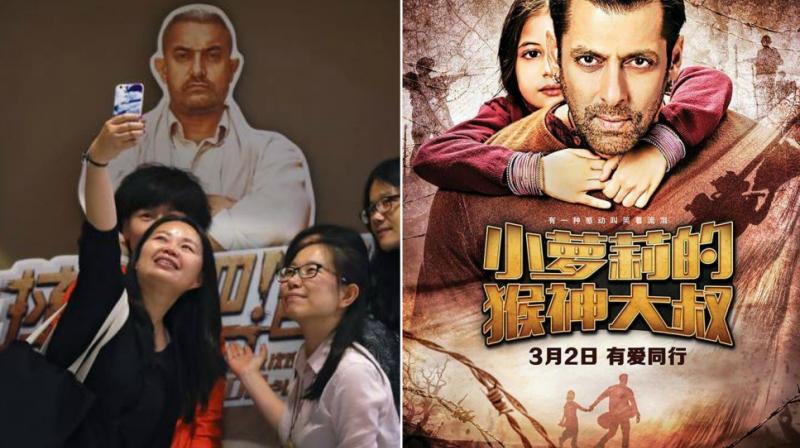 Aamir Khan fans in China with a cutout from Dangal, Salman Khans Bajrangi Bhaijaan poster in China.