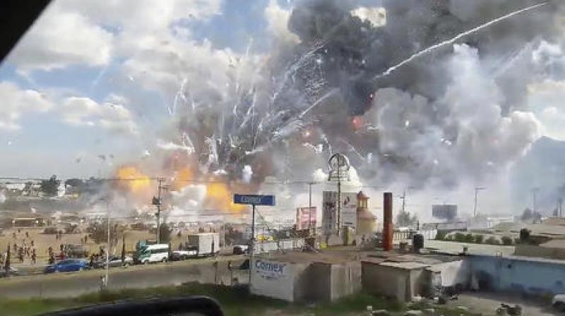This image made from video recorded from a passing car shows an explosion ripping through the San Pablito fireworks market in Tultepec, Mexico. (Photo: AP)
