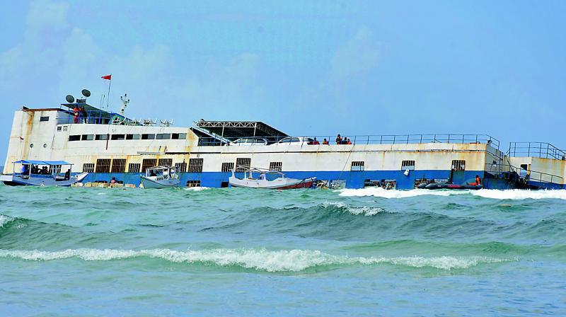 The sinking ferry Lestari Maju off Selayar island, South Sulawesi, Indonesia on Wednedsay.  Image: AP)