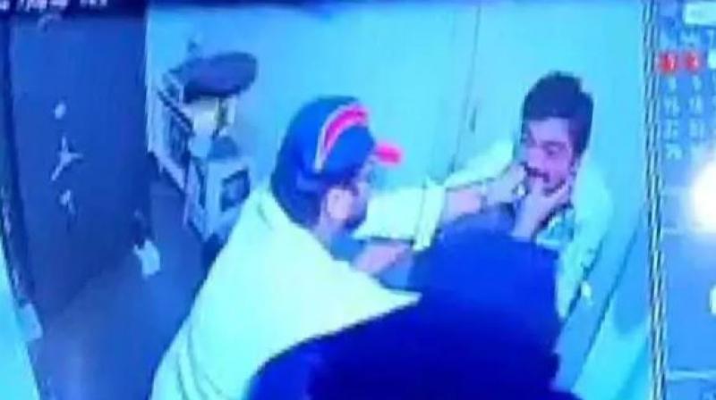 The CCTV footage from inside the strongroom shows a masked man threatening 32-year-old Jayaram with a gun. (Photo: Screengrab | ANI)