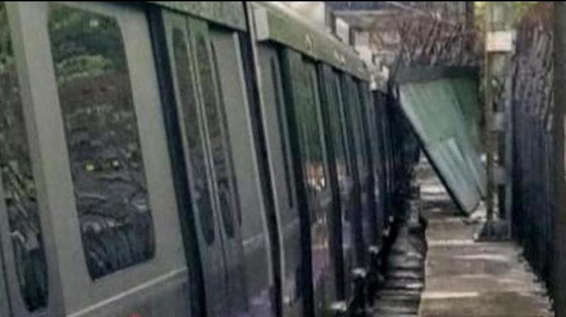 Delhi Metro Violet line services between Jangpura and Lajpat Nagar were halted after a portion of a railing wall collapsed. (Photo: ANI | Twitter)