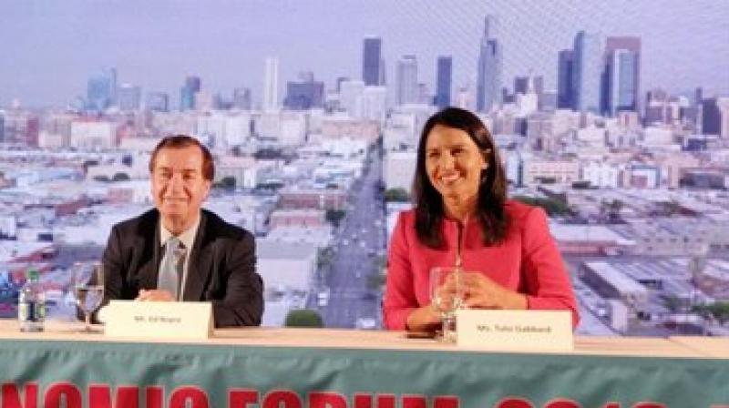 Congressman Ed Royce and Congresswoman Tulsi Gabbard at the World Hindu Economic Forum meeting at Los Angeles. (Photo: AP)