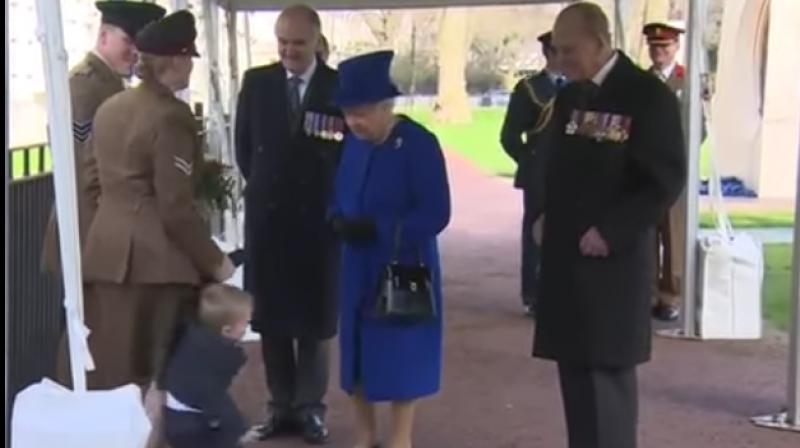 The 90-year-old queen is also a great grandmother and didnt appear fazed by the meltdown and simply smiled. (Photo: Youtube)