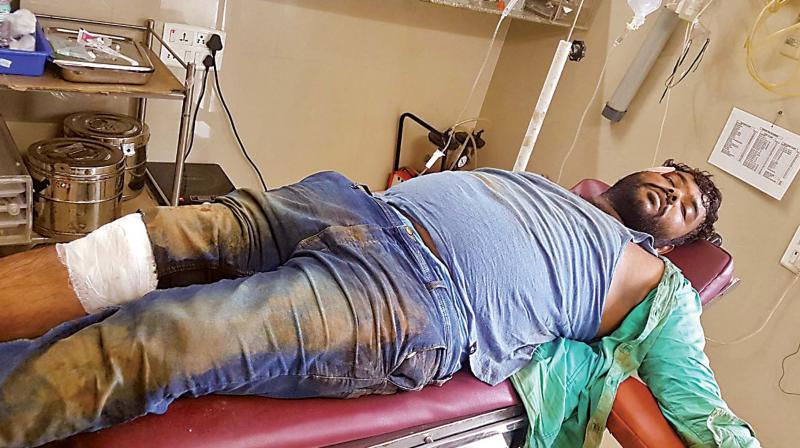Chain-snatcher Achuth Kumar Gani, being treated in a hospital, in Bengaluru on Monday. (Inset) Head Constable Chandra Kumar.	DC
