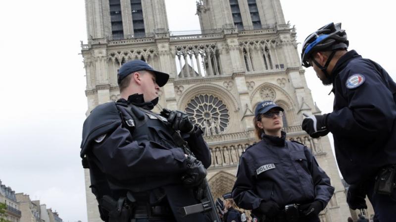 A French government spokesman says that the man who attacked police officers patrolling in front of Notre Dame Cathedral, crying out â€œThis is for Syria!,â€was a student working on his doctoral thesis who showed no signs of radicalization. (Photo: AP)
