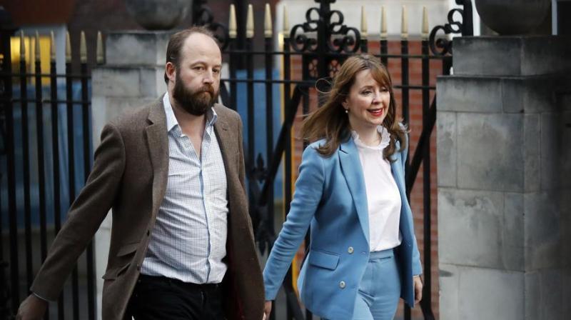 Prime Minister Theresa Mays chief of staff Nick Timothy, left, and Joint-chief of staff Fiona Hill leave Conservative Party headquarters in London. British Prime Minister Theresa Mays two chiefs of staff have resigned in the wake of the Conservative Partys disastrous election result. (Photo: AP)