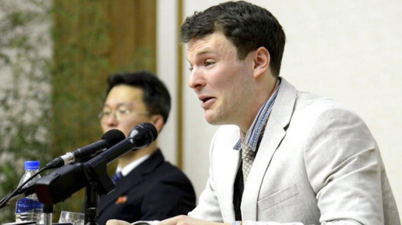 American student Otto Warmbier cries while speaking to reporters in Pyongyang, North Korea. The family of Warmbier who died days after being released from North Korea in a coma says the 22-year-old \has completed his journey home.\ Warmbier died Monday, June 19. (Photo: AP)