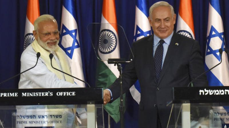 Indian Prime Minister Narendra Modi, left, and Israeli Prime Minister Benjamin Netanyahu shake hands at Netanyahus residence in Jerusalem, Israel. (Photo: AP)