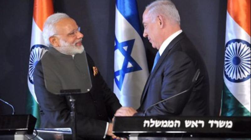 Prime Minister Narendra Modi shakes hands with Israeli Prime Minister Benjamin Netanyahu during a joint press conference in Jerusalem, Israel. (Photo: AP)