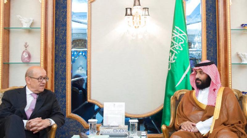 Saudi Crown Prince Mohammed bin Salman, right, receives French Foreign Minister Jean-Yves Le Drian in Jiddah, Saudi Arabia on Saturday. (Photo: AP)