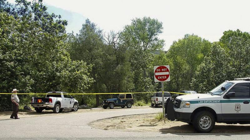 The Water Wheel Campground parking lot is blocked off by authorities Sunday, July 16, 2017, in the Tonto National Forest, Ariz., after a deadly flash-flooding hit Saturday afternoon at Cold Springs canyon. (Photo: AP)