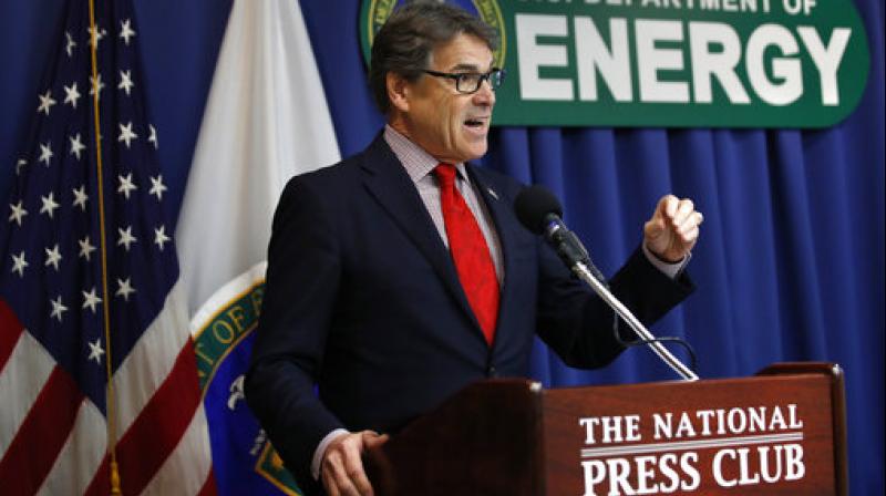 Energy Secretary Rick Perry speaks during a news conference, at the National Press Club in Washington.