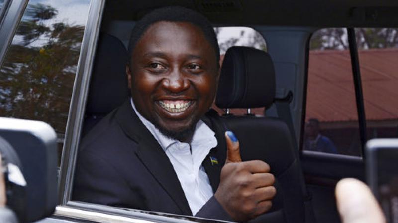 Presidential candidate Frank Habineza, of the opposition Democratic Green Party, gives the thumbs up after casting his ballot in Rwandas capital Kigali. (Photo: AP)
