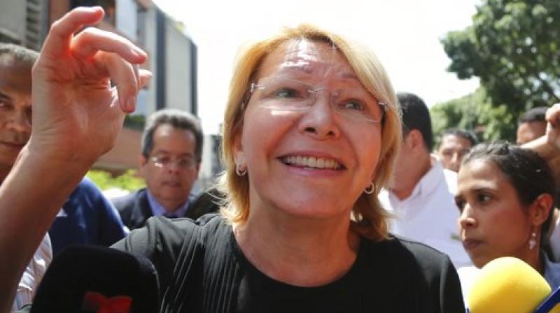 Venezuelan General Prosecutor Luisa Ortega Diaz speaks to the media outside her office after security forces surrounded the entrance, in Caracas, Venezuela. (Photo: AP)