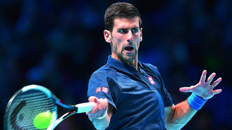 Novak Djokovic en route to his victory over Milos Raonic during the ATP Tour Finals at the Londons O2 Arena (Photo: AFP)