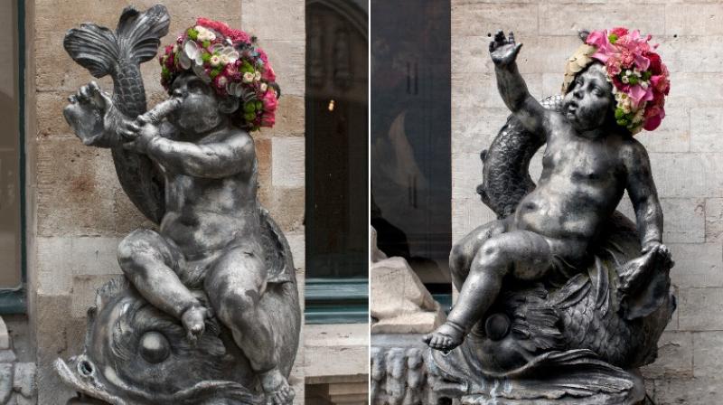 Cherubs in Brussels adorned with colourful floral headdresses for Flowertime, an international flower arranging event.(All Images provided by Geoffroy Mottart)