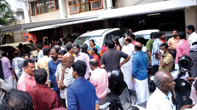 Crowd gathered in front of the BJP state headquarters in Thiruvananthapuram on Friday morning. (Photo: DC)